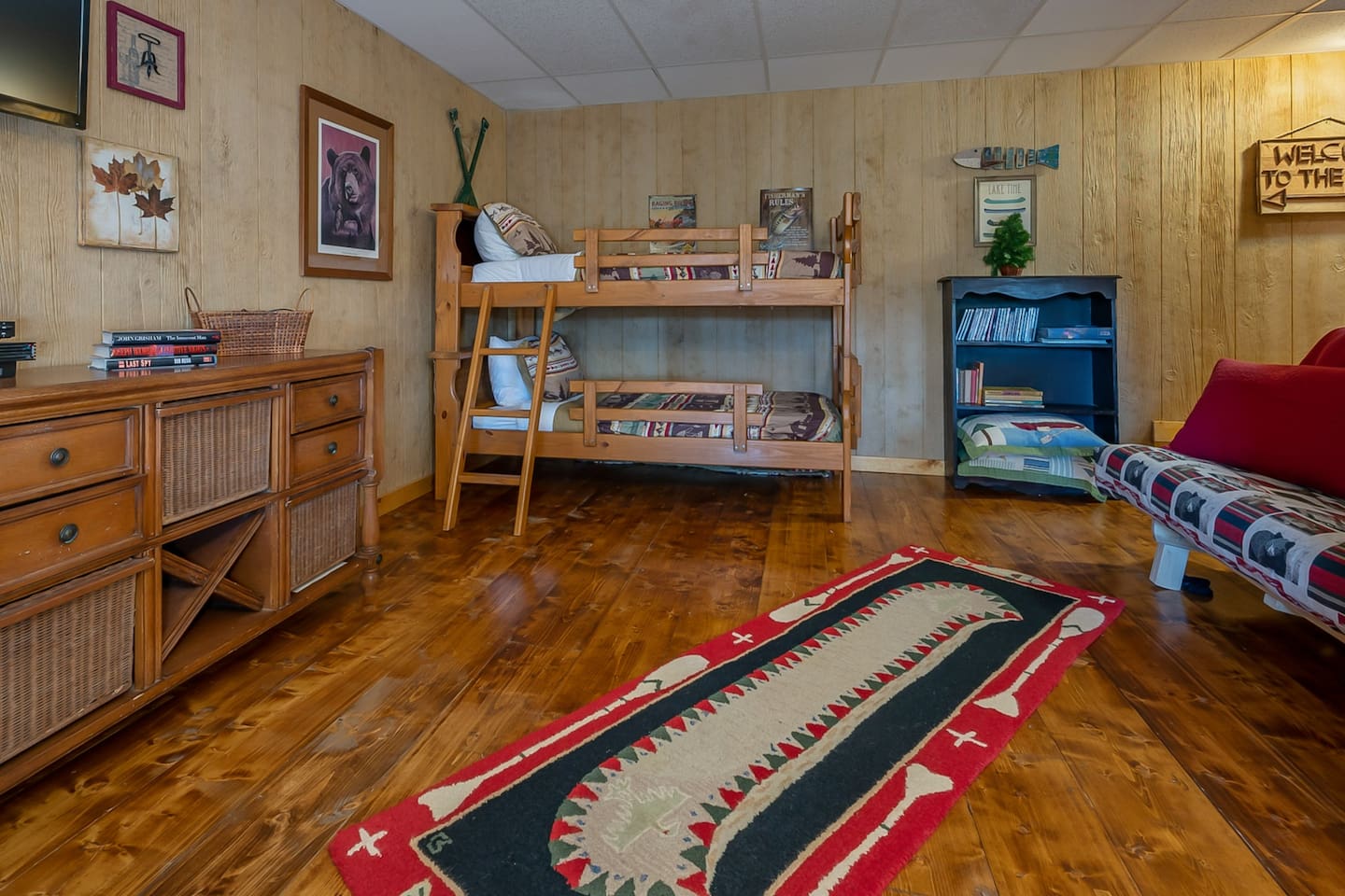 Bedroom 4 with set of bunk beds and Queen futon sleeper - downstairs, open to game room.  Gameroom opens to lower deck with seating, log swing and spectacular views!