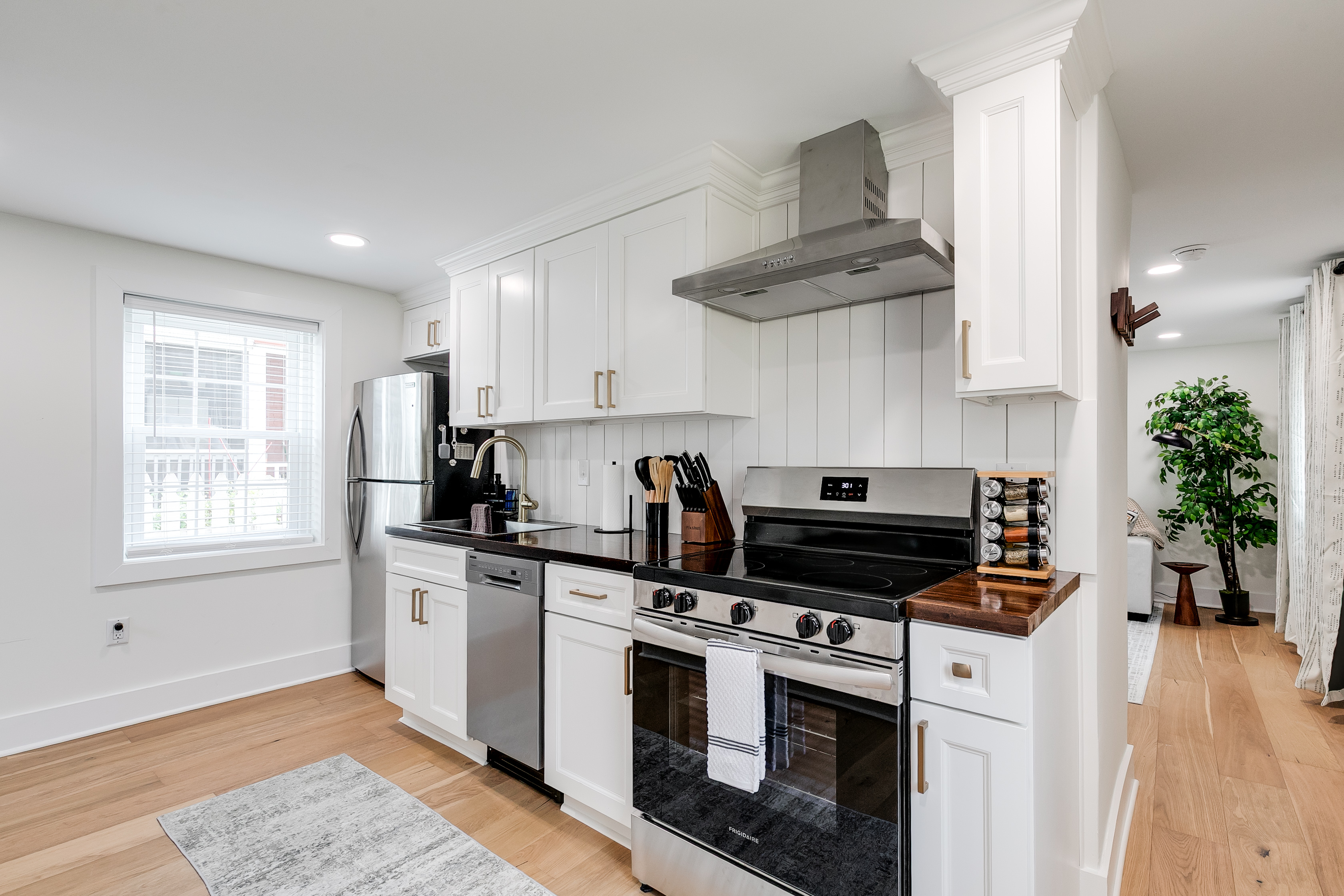 Chic Kitchen: Modern appliances and elegant details perfect for culinary adventures!