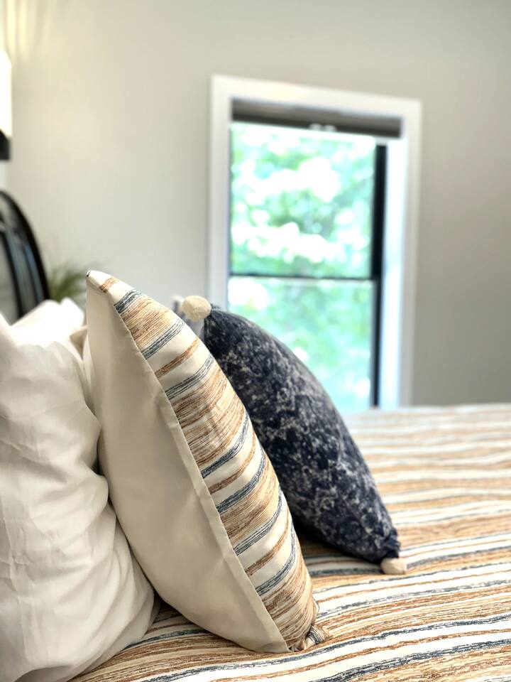Quality bedding, extra pillows, and blankets for a restful night's sleep. 