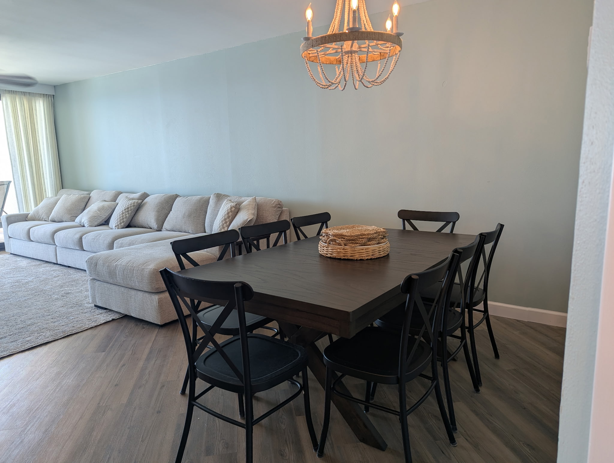 Dining with perspective relative to living room