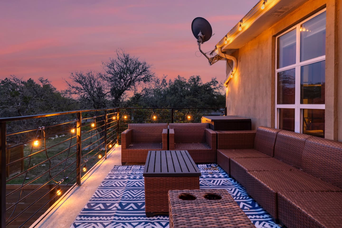 Unwind above the treetops with sunset skies, glowing string lights, and a cozy lounge made for evening conversations. The perfect spot to sip wine, breathe deep, and ease into vacation mode.
