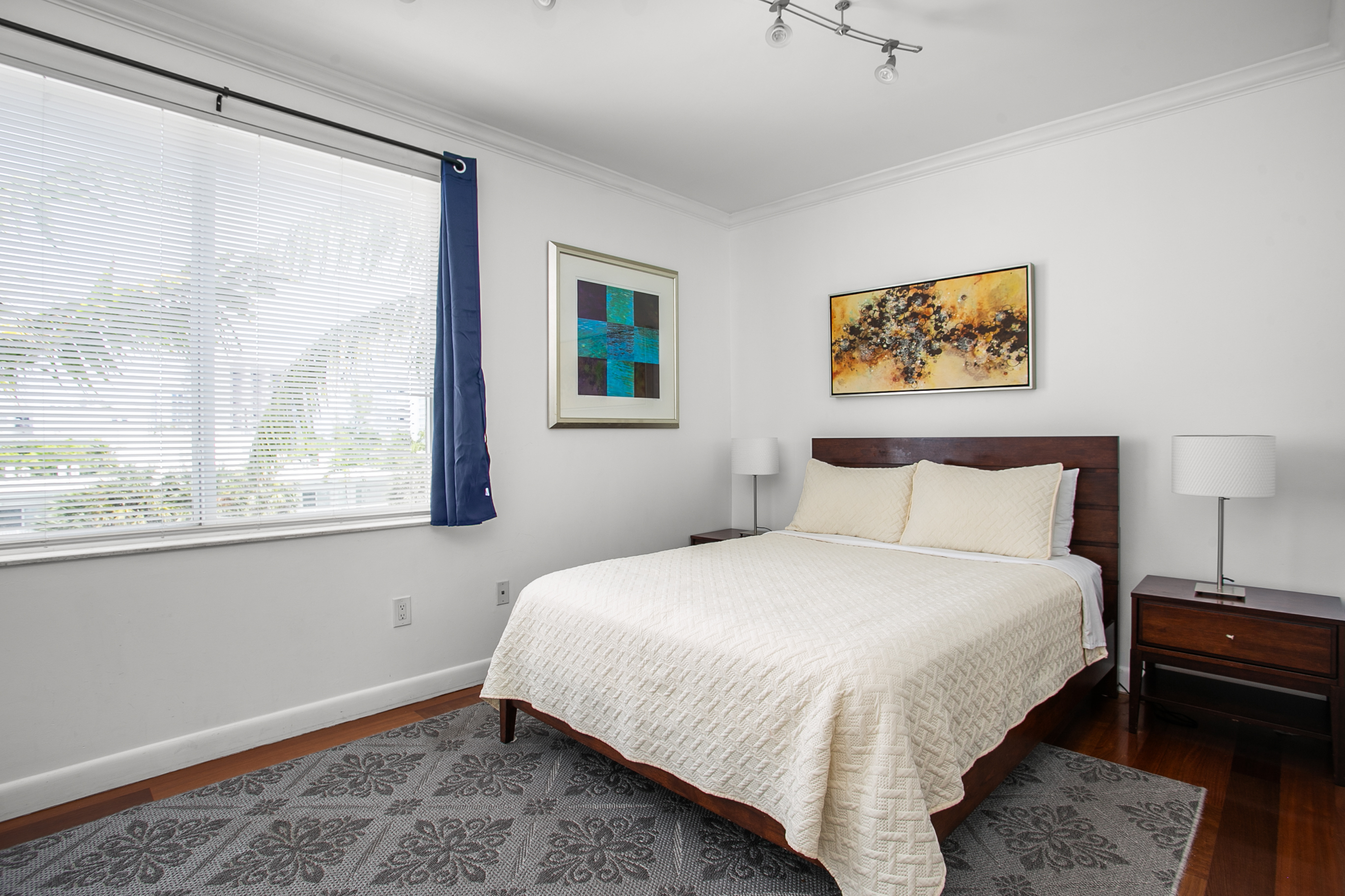 Guest Suite with en-suite bath, closet storage, and room-darkening curtains
