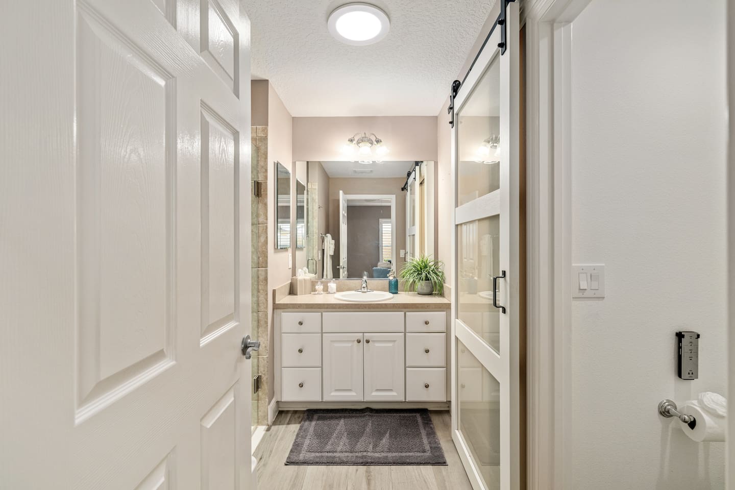 The pictures do not do this bathroom justice!  Private toilet with a sliding door, walk in shower and a walk-in closet are all waiting for you in the master bathroom.