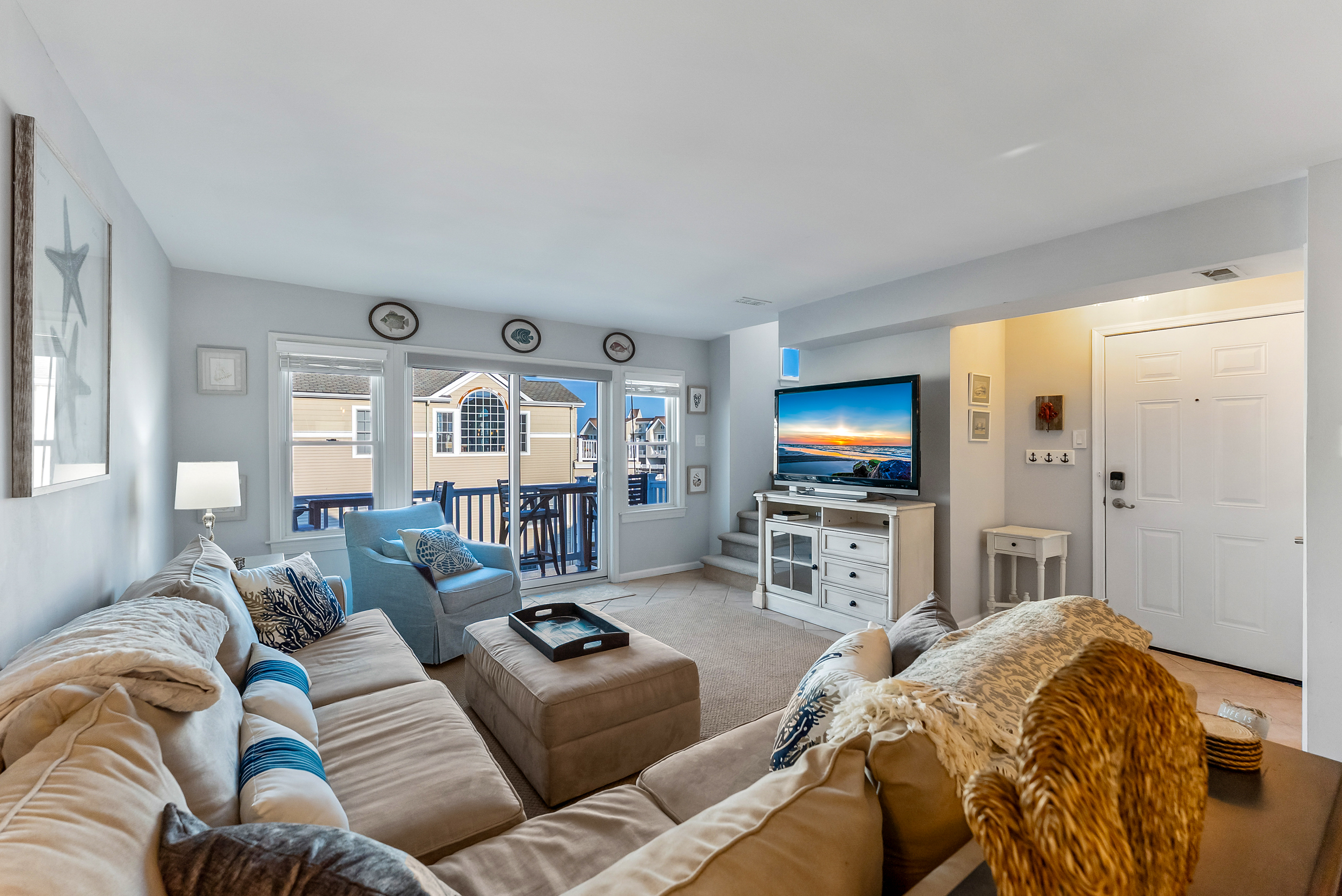 Living Room with Access to Private Outdoor Covered Patio