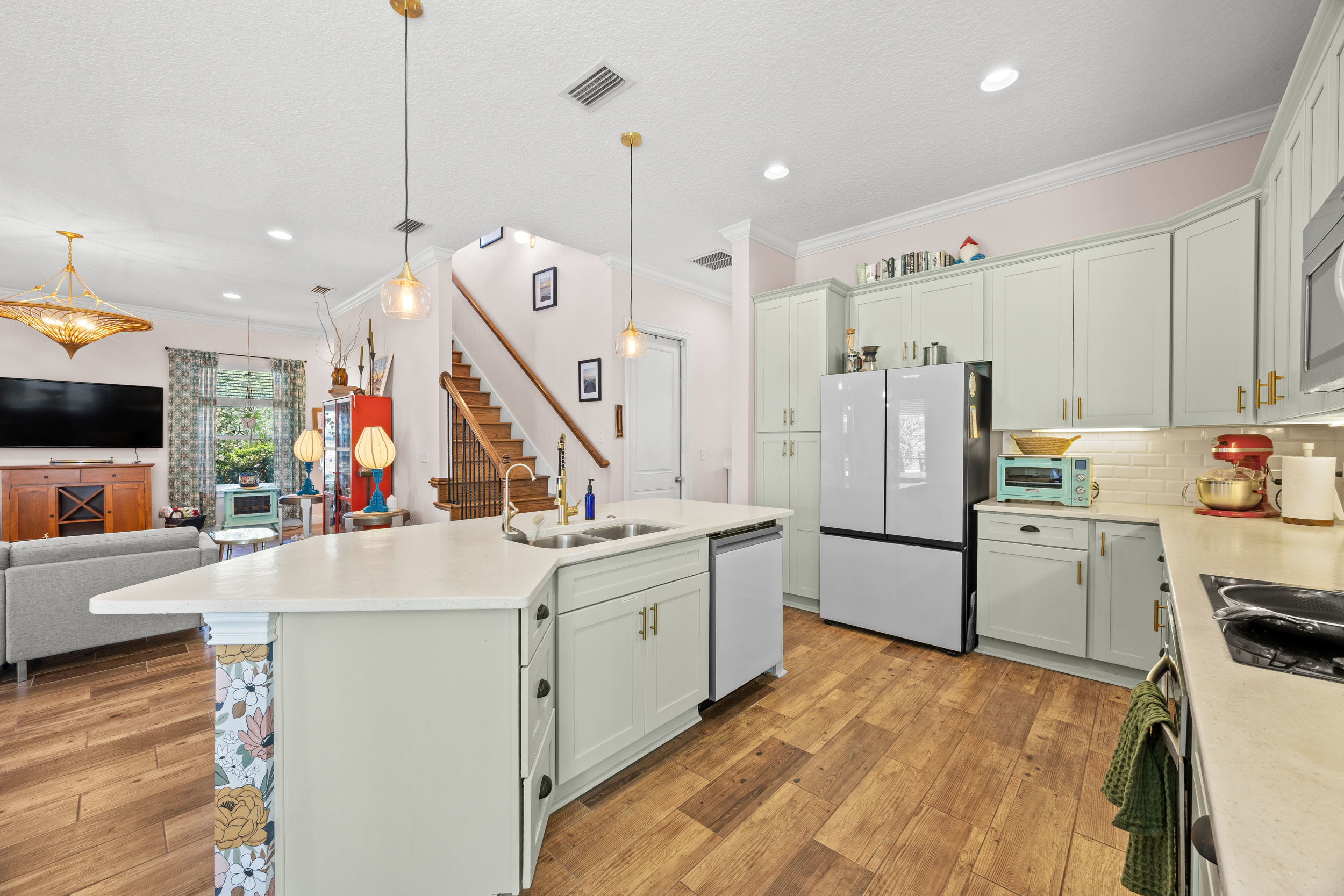 Open kitchen and living space with stylish décor — perfect for relaxing after the beach.