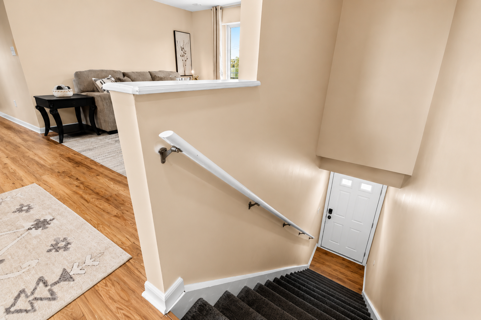 Thoughtfully designed split-level layout with easy access between spaces, featuring warm wood flooring and a bright, modern interior throughout.