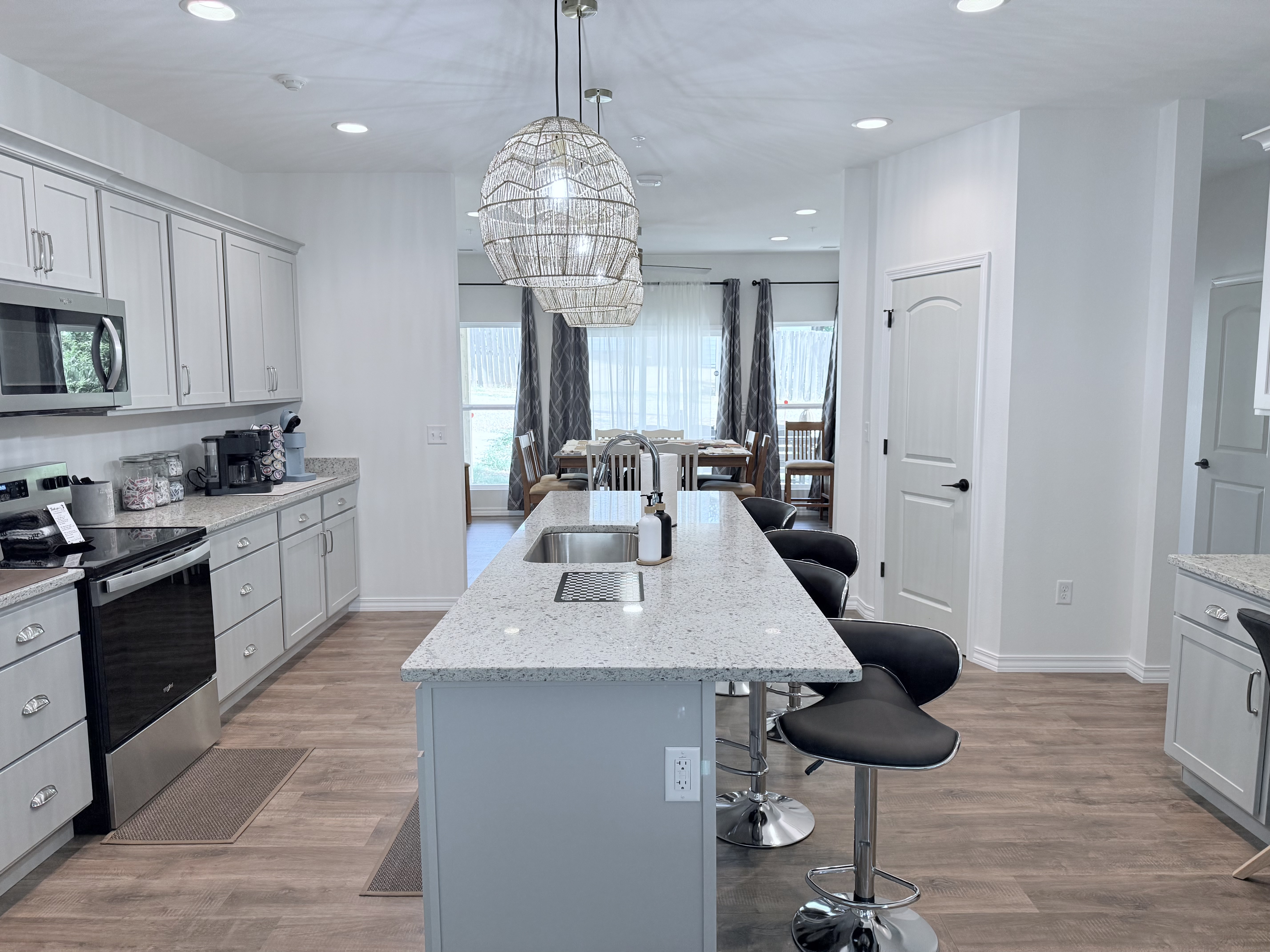 Huge gourmet kitchen is open to living room and dining room. Perfect for large gatherings.