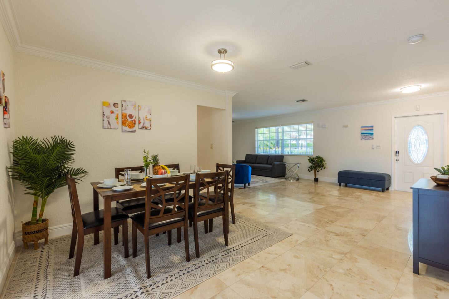 Enjoy the classic designed wood dining room table right off the kitchen with 6 settings.
