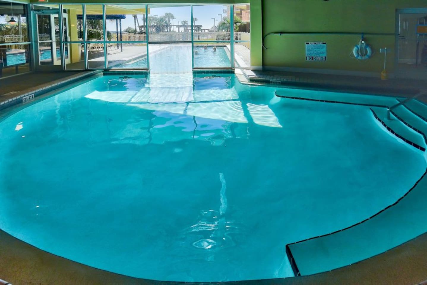 indoor pool with swim to on of the outdoor pools...