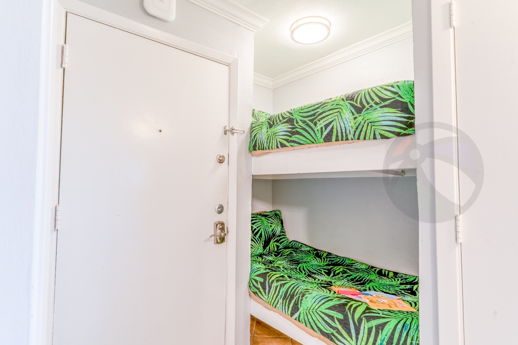 Across the hall are the alcove built in bunks (ladder in closet)