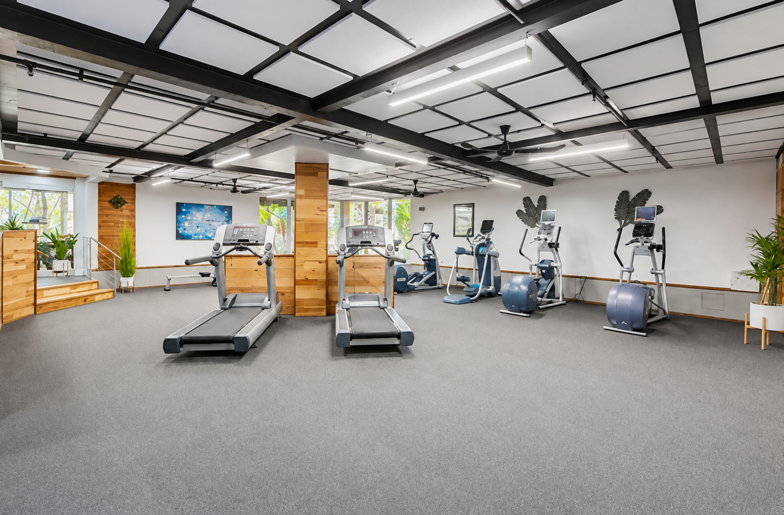Adults-only fitness center beneath the lagoon waterfall