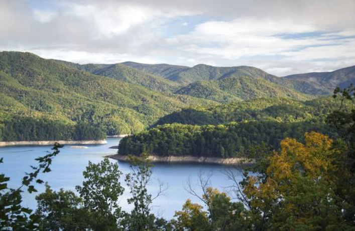 Lake View Escape: Unwind with stunning lake and mountain vistas just minutes from adventure!