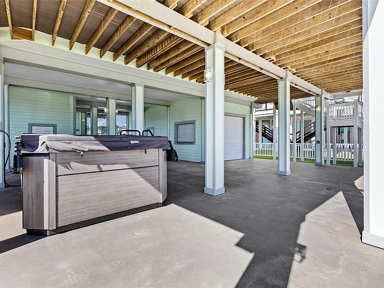 Crystal Paradise Outdoor Space: Relax and unwind in the ultimate water escape—enjoy the soothing hot tub or take a refreshing dip in the swim spa, right at your doorstep.