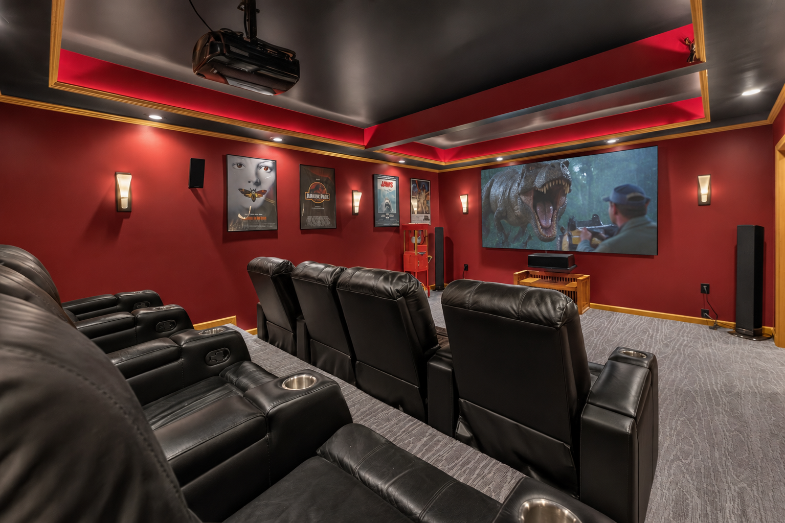 Theater room with large screen and recliners