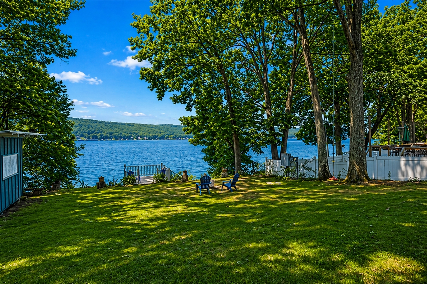 Enjoy the large, private yard that leads directly to the lake. Ideal for outdoor activities or an evening by the fire pit. 