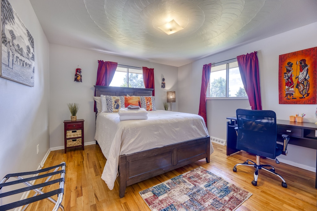 Enjoy some quiet sleep in our Themed Bedrooms with blackout curtains. Ngombe Room is the Front bedroom with beautiful Kenyan Artwork of the Maasai people herding cattle.  Luggage Rack provided.
