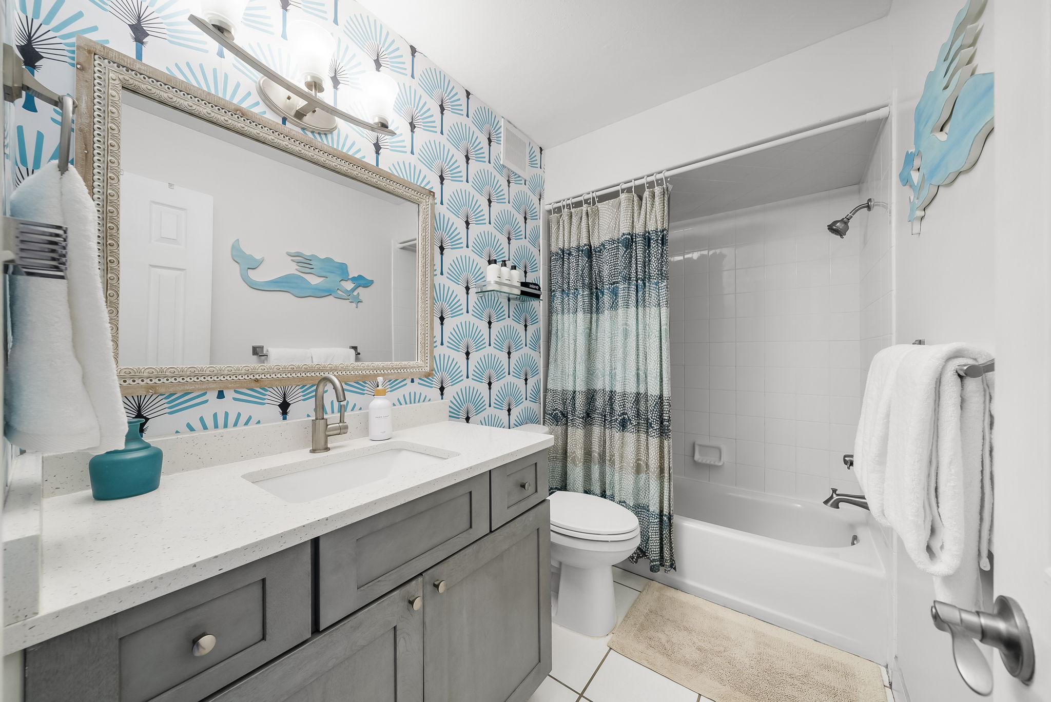 Master Bathroom offers shampoo, conditioner, body wash, makeup towels and plush white bath towels for that luxurious spa feel.