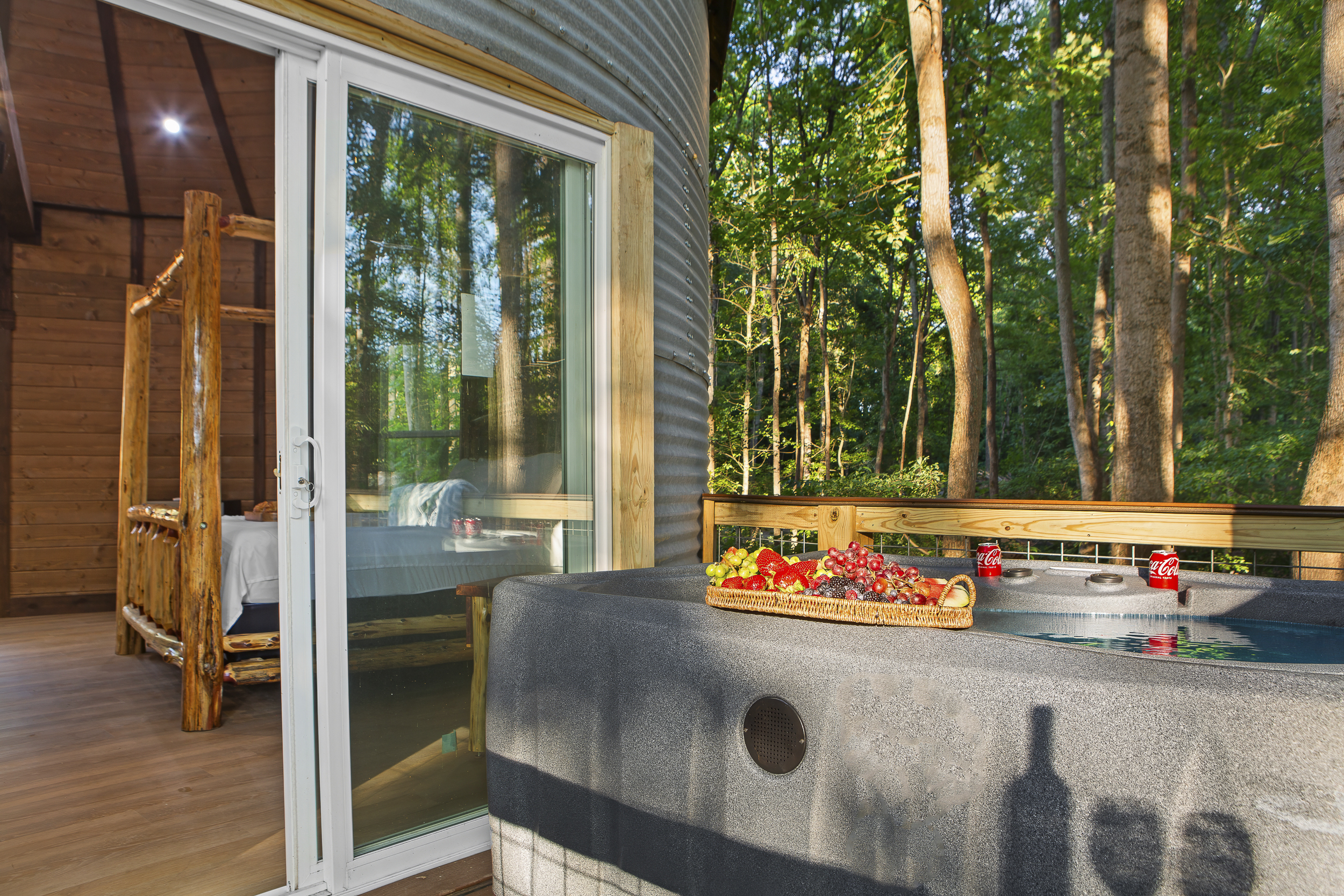 Outdoor Retreat: Unwind in the hot tub with fresh fruit and serene forest views!