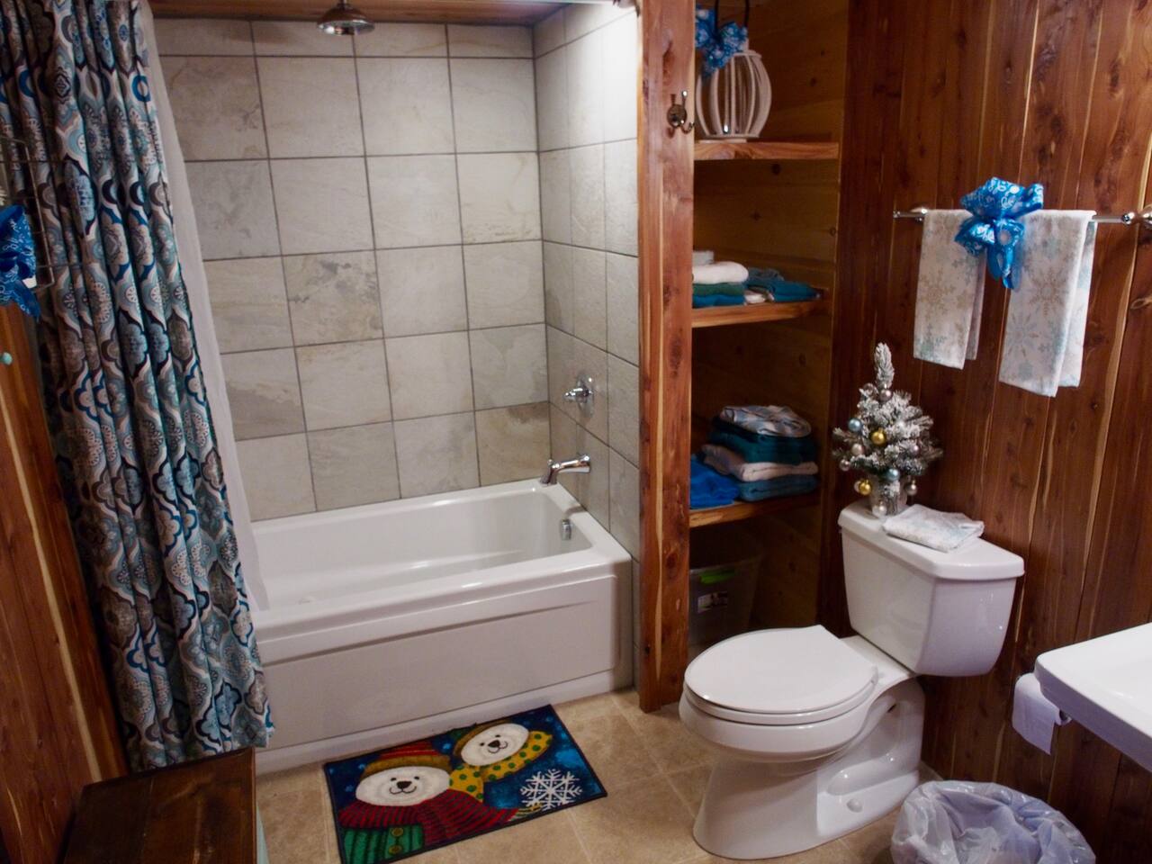 Beautiful Bathroom with Jetted Tub and Rainforest Shower