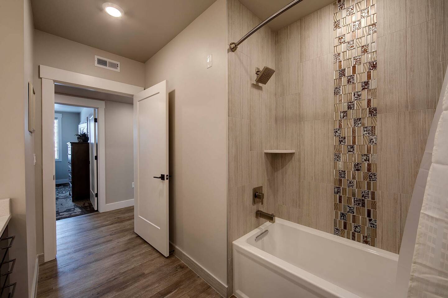 There's a tub/shower combo in the second bathroom, located across the hall from bedrooms #2 and #3.