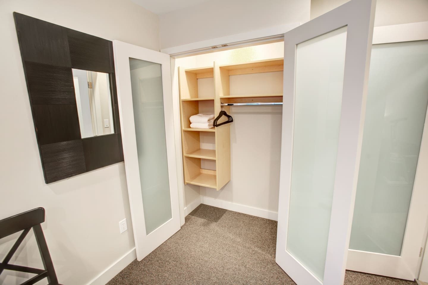 All bedroom closets have built-in organizers and motion detection lighting