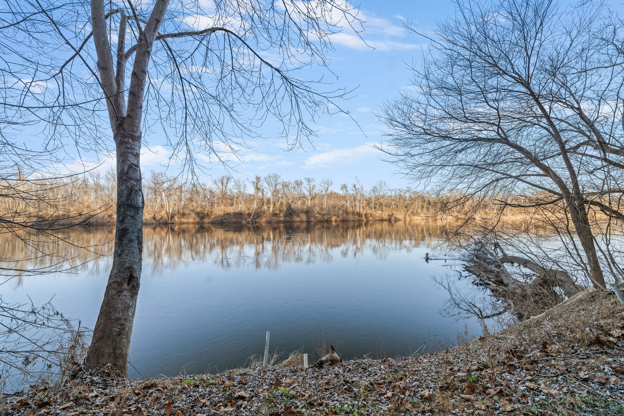 Riverside Retreat: Breathe in serenity while enjoying stunning river views from your own backyard!