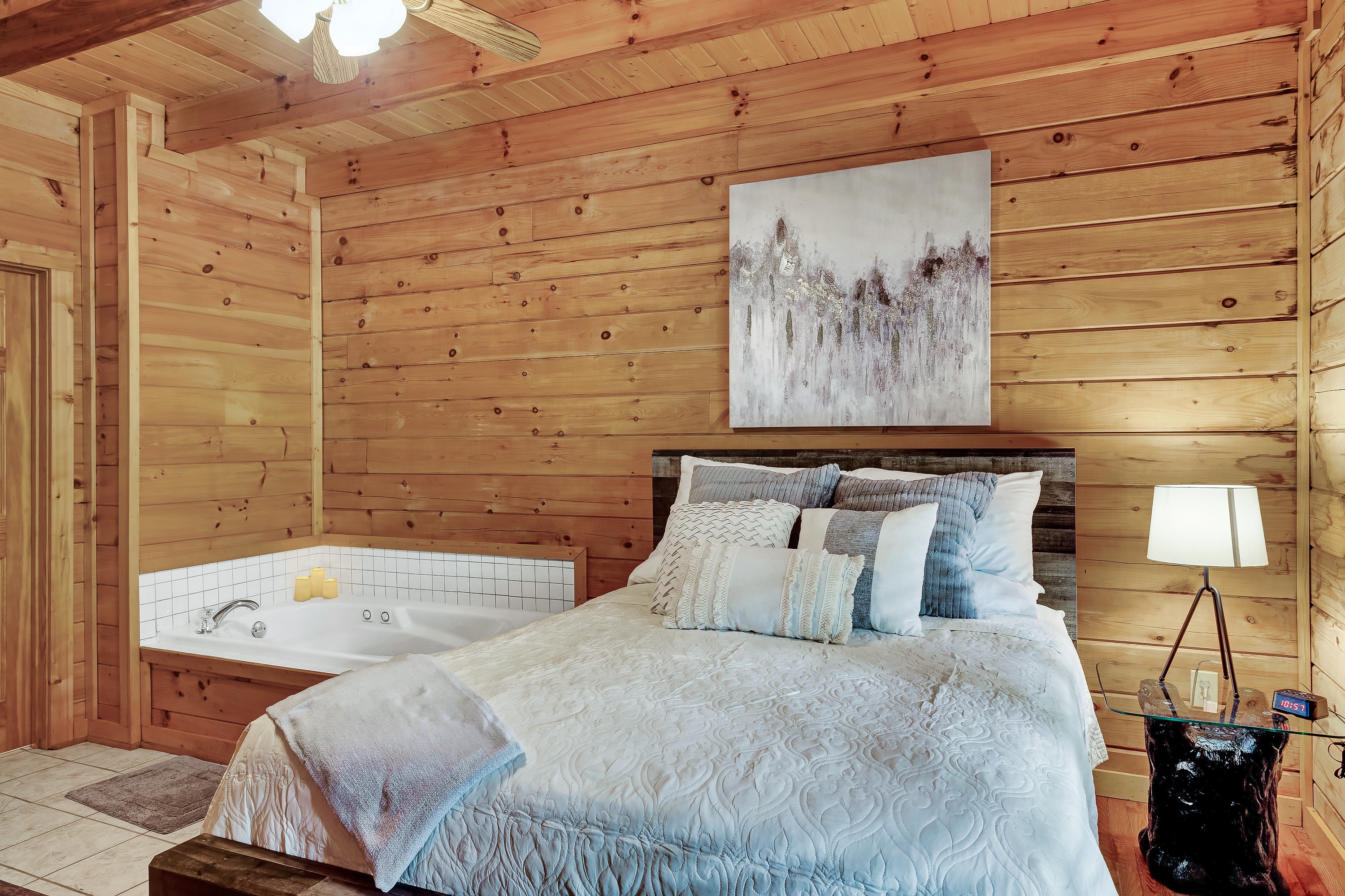 The main floor bedroom is a peaceful retreat with ensuite bathoom, jetted tub and is just off the family room. 