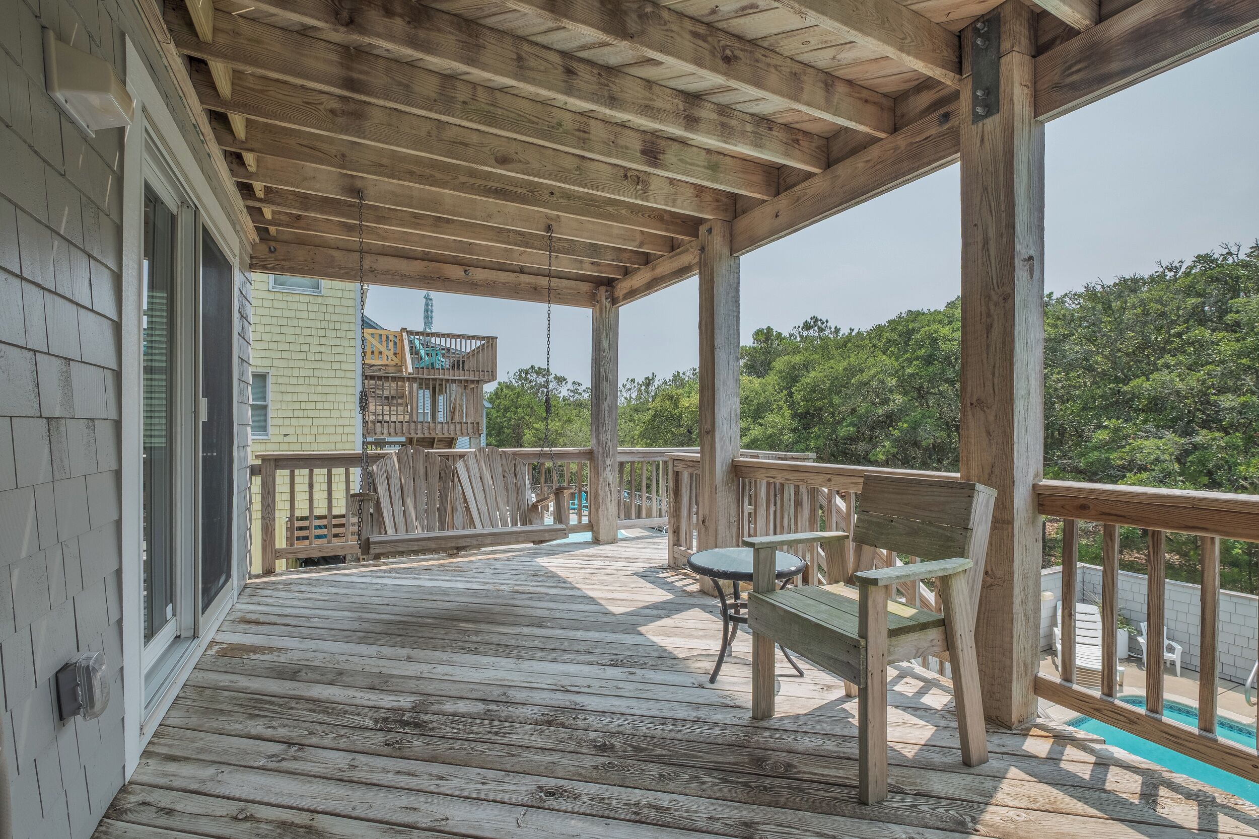 Shaded terrace space perfect for cool afternoon lounging.