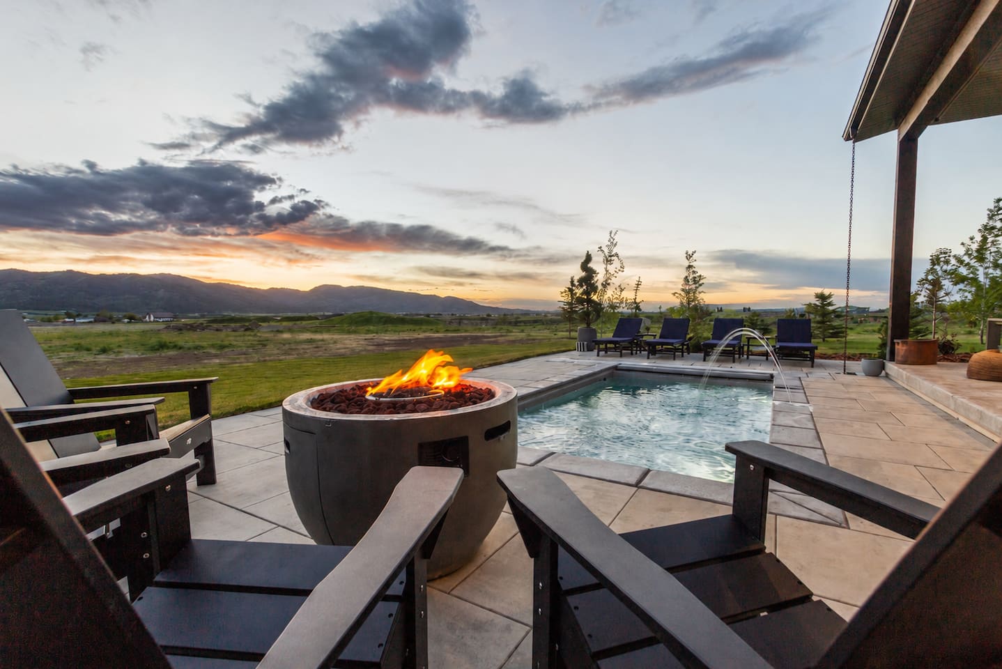 Heated pool, fire pit, and stunning sunset views—the perfect place to unwind after a day of adventure.