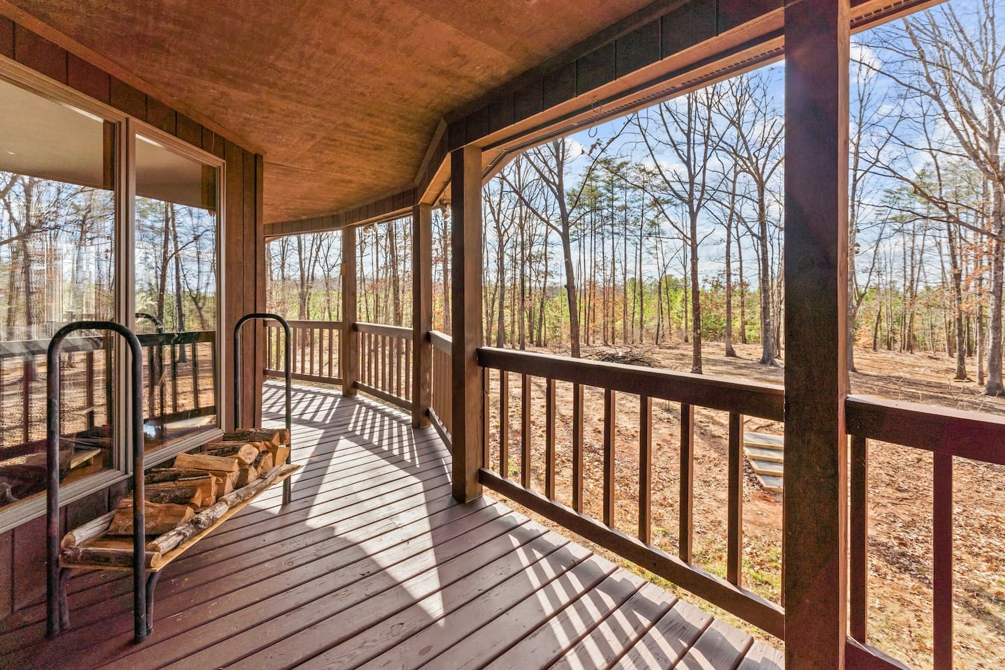 Outdoor Deck: Embrace nature on this spacious deck with woodland views and inviting sunlight!