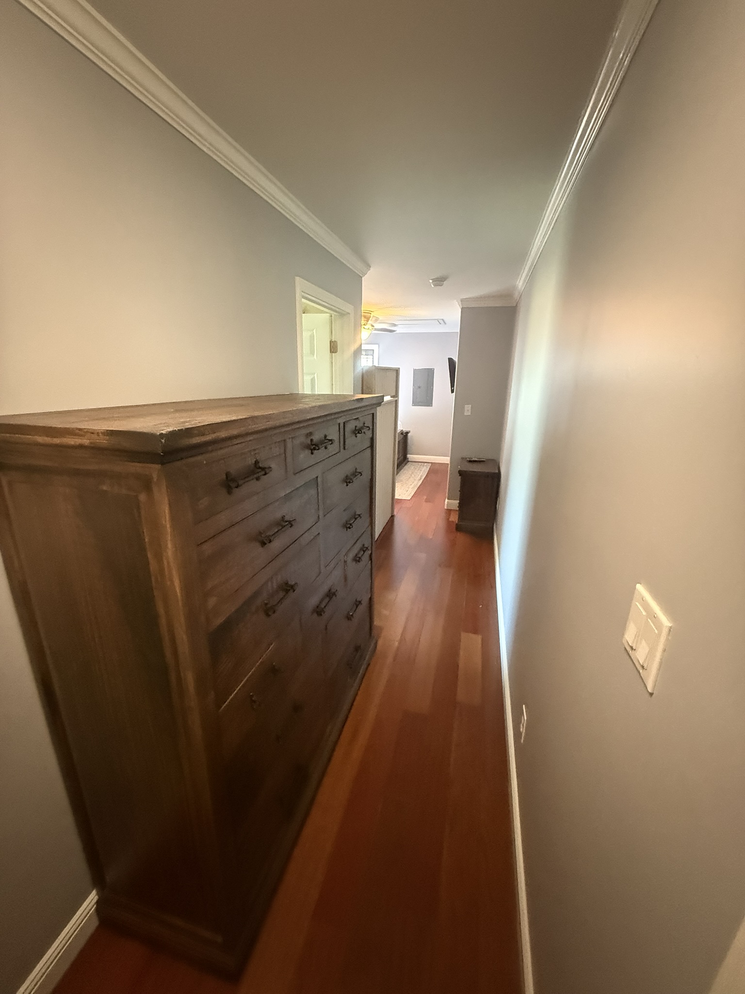 Entrance to Bedroom 3 with a large top-quality dresser with plenty of room for clothes