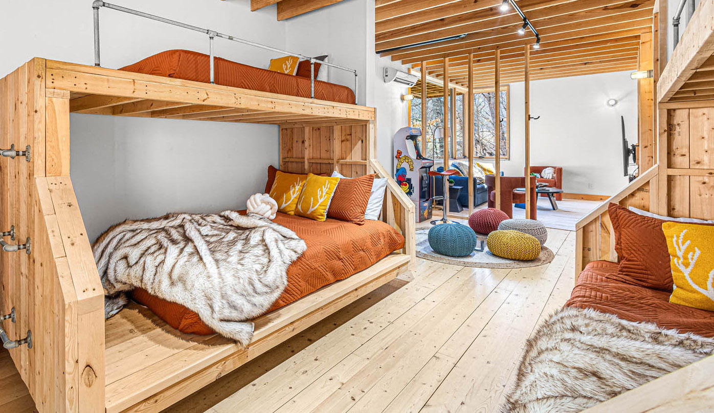 Shared bunk area with four queen-size mattresses. This in the flex sleeping area and not a private bedroom.