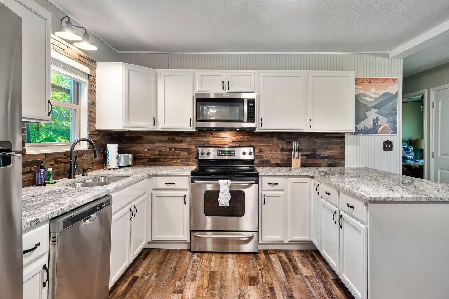 Welcome to your fully stocked kitchen, complete with sleek granite countertops, modern stainless steel appliances, and all the cookware and utensils you'll need for a great meal.  #Readytoeat