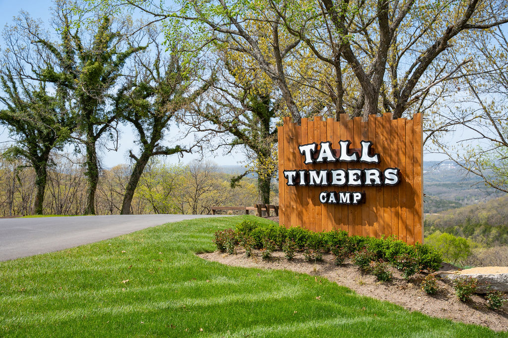 Turn off the highway and arrive at Tall Timbers Camp, your Ozark cabin retreat in Hollister, MO.