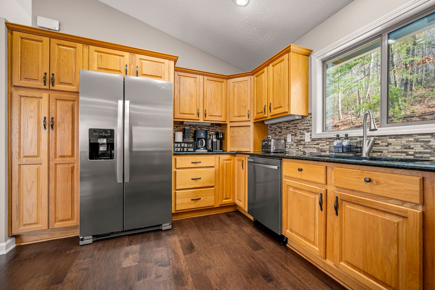 Fully stocked kitchen with stainless steel appliances and more