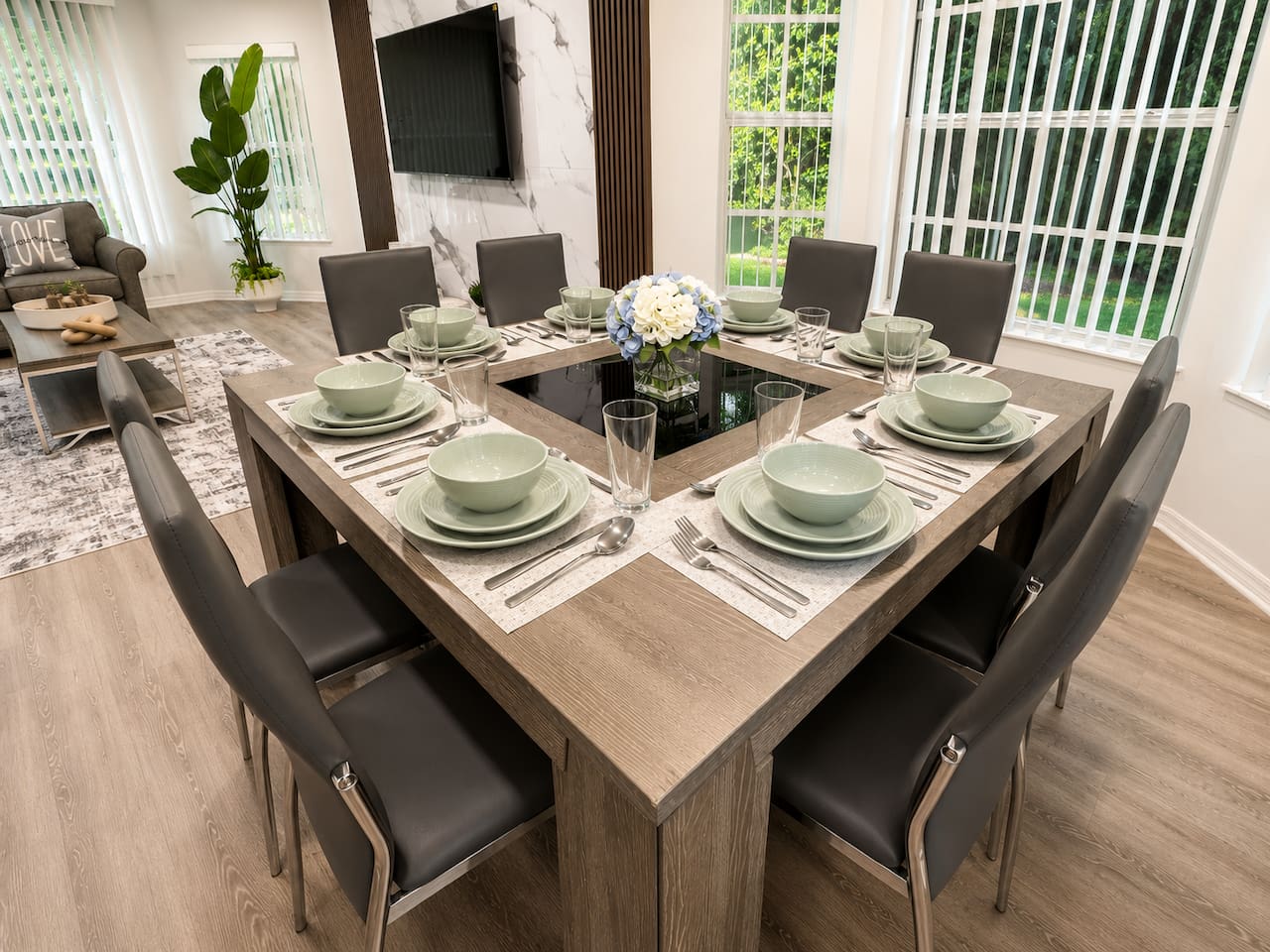 Dining table set for 8, ideal for shared meals and family gatherings.
