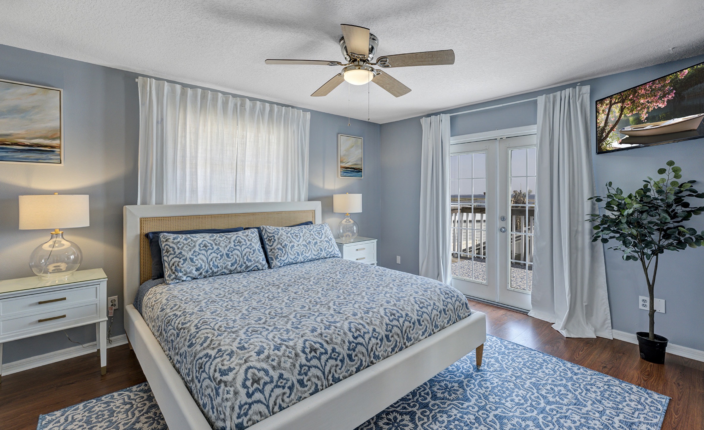 King size luxury bedding and mattress with adjacent master bathroom and closet