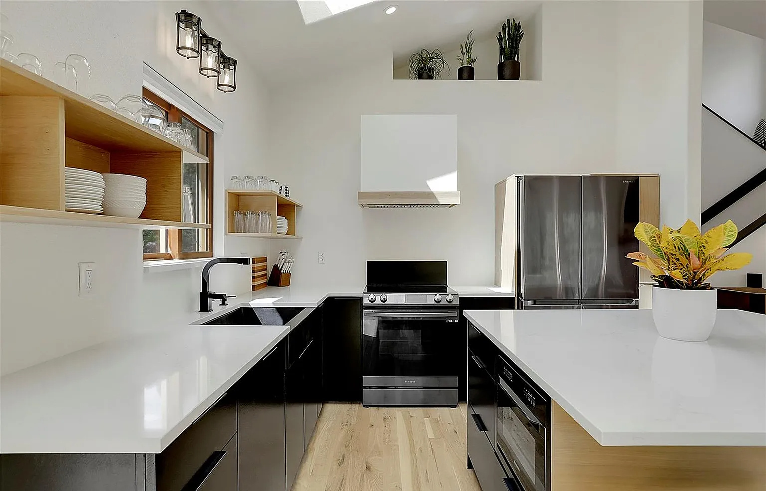Seamlessly connected to the living area, this fully equipped kitchen and adjacent dining space make hosting effortless, whether you're whipping up a quick breakfast or settling in for a family dinner.