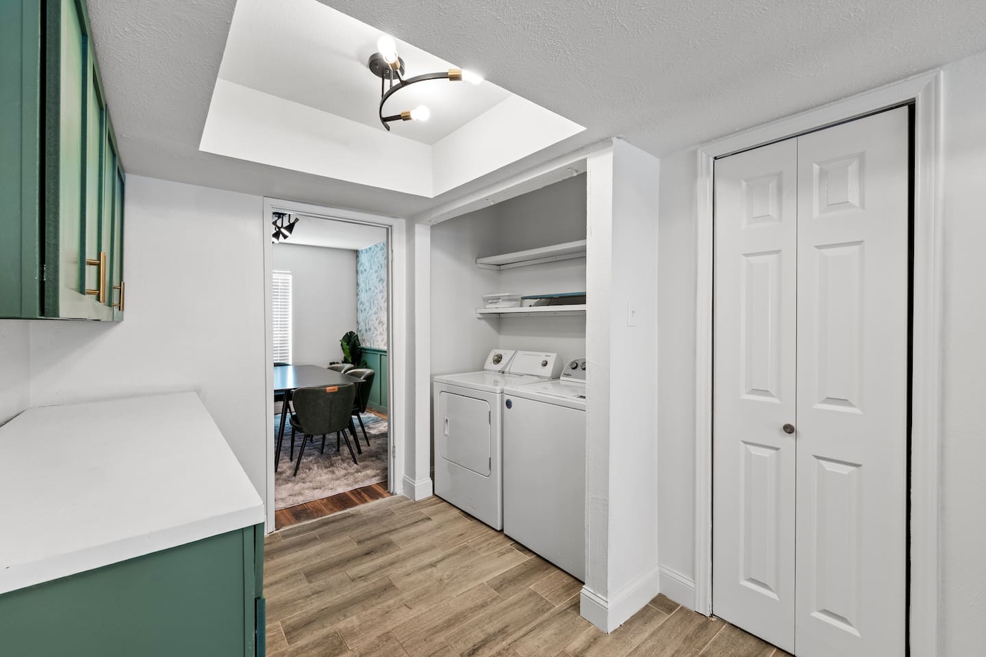 Spacious and seamless design ties together the kitchen, dining, and living areas for effortless flow and easy gathering.
