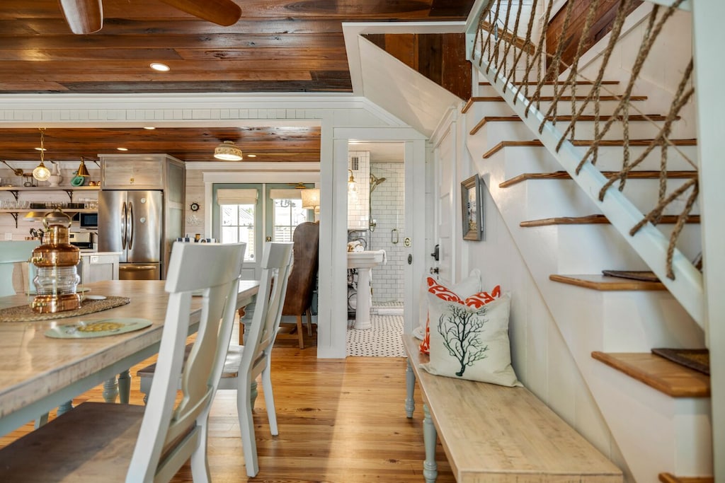 The bench to pull up to the dining table when needed.