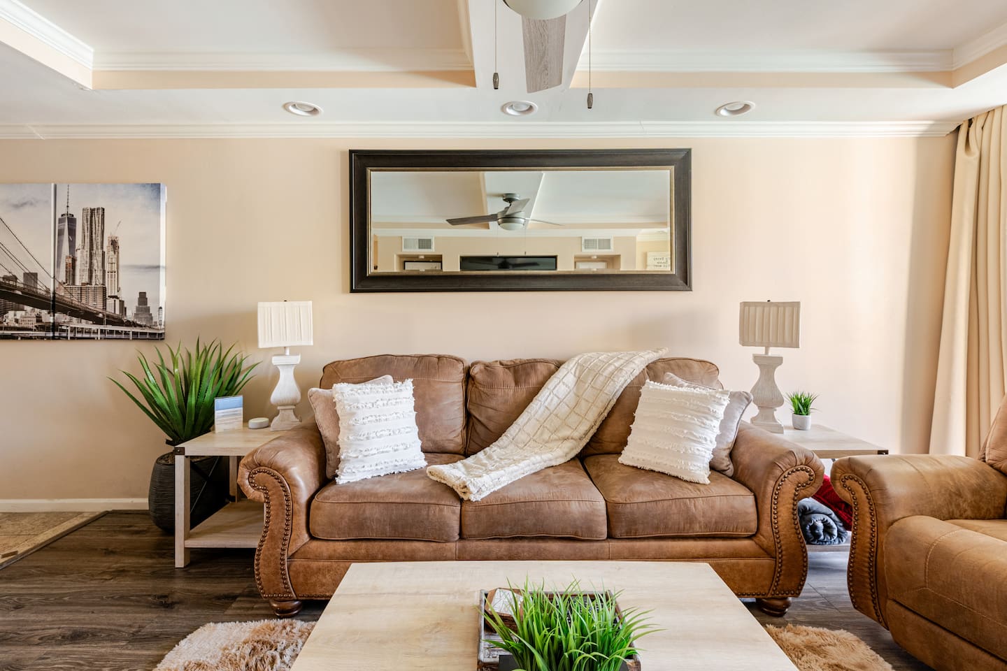 Relaxing living room includes queen sleeper sofa with memory foam mattress.