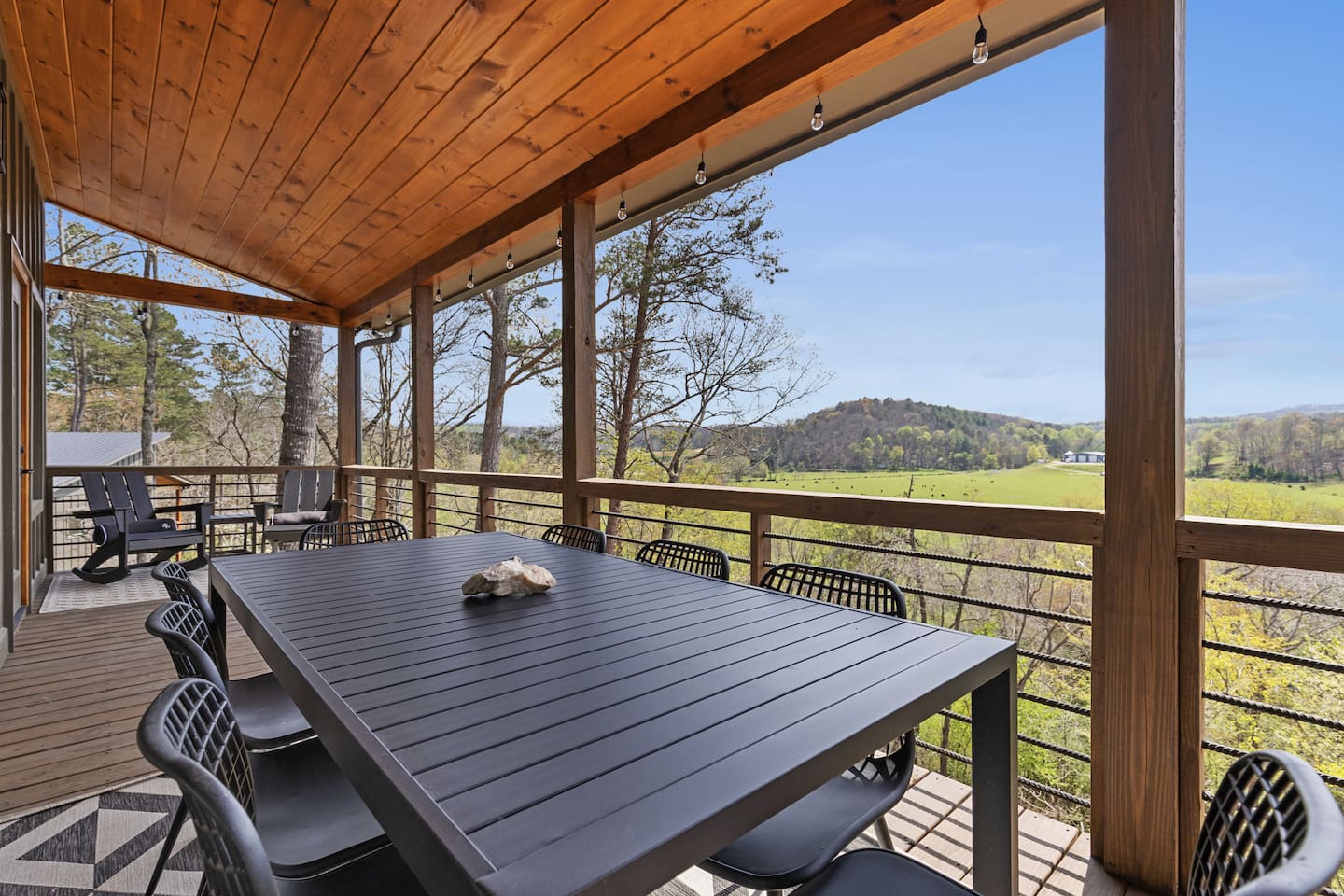 Dine alfresco while watching the cows and horses graze outside. Located on the upper deck, just outside of the kitchen.