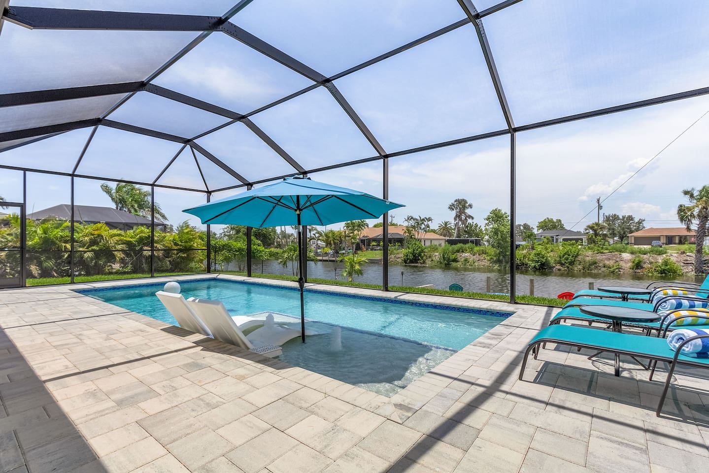 Crystal clear heated saltwater  pool with breathtaking waterfront view