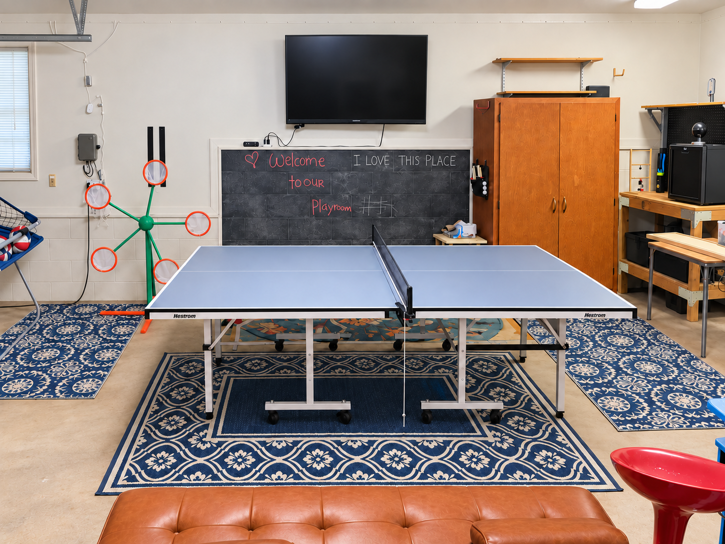 Game room with ping pong, foosball, arcade games, TV, and plenty of space for group fun.