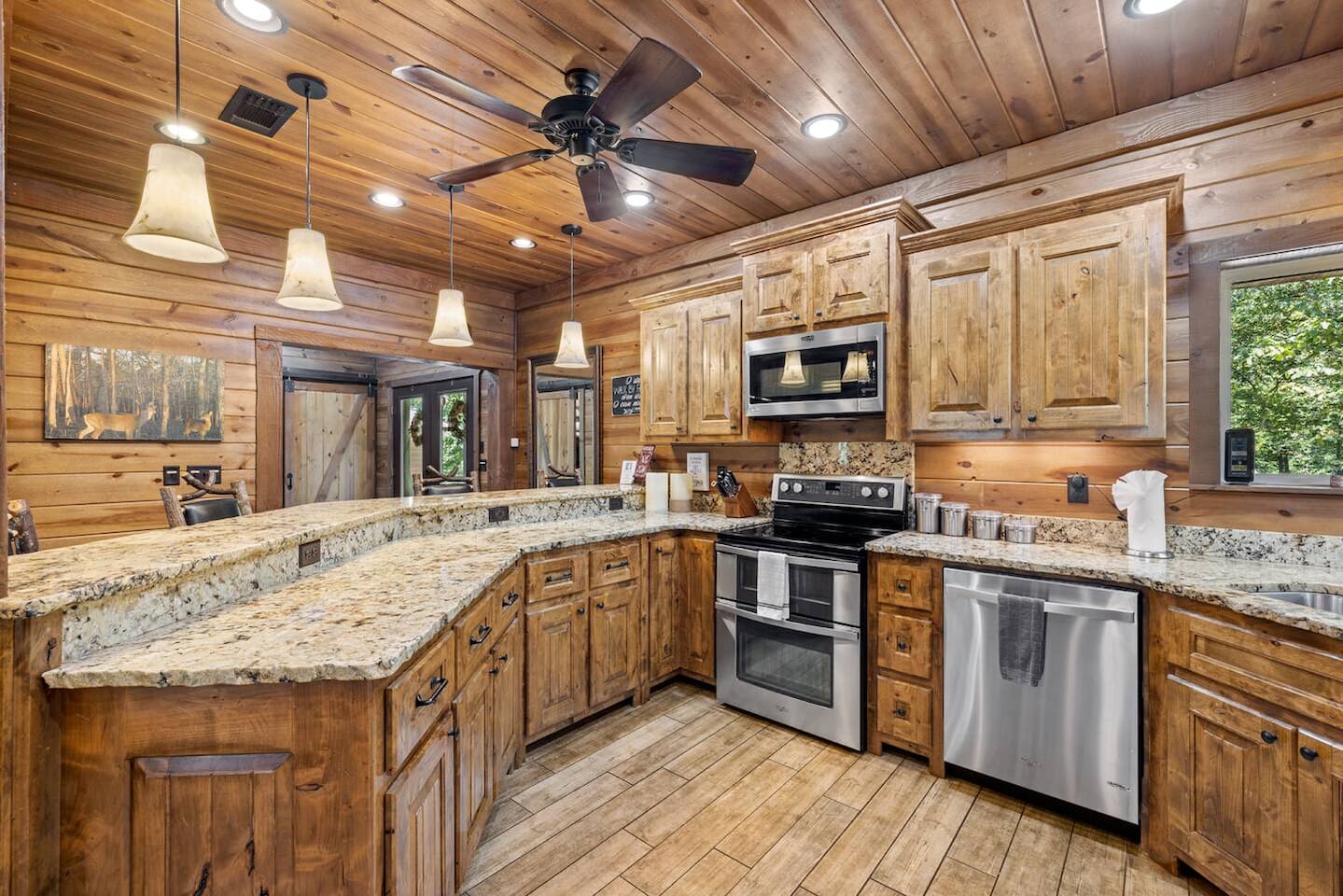 Cook with ease in a fully stocked kitchen featuring stainless steel appliances and modern finishes.