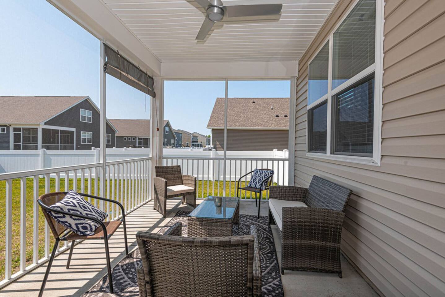 Step into our inviting screened-in porch! Enjoy ample seating for seven, inviting you to unwind amidst nature's embrace. A gentle ceiling fan ensures a pleasant ambiance, making it an ideal spot for relaxation and gatherings.