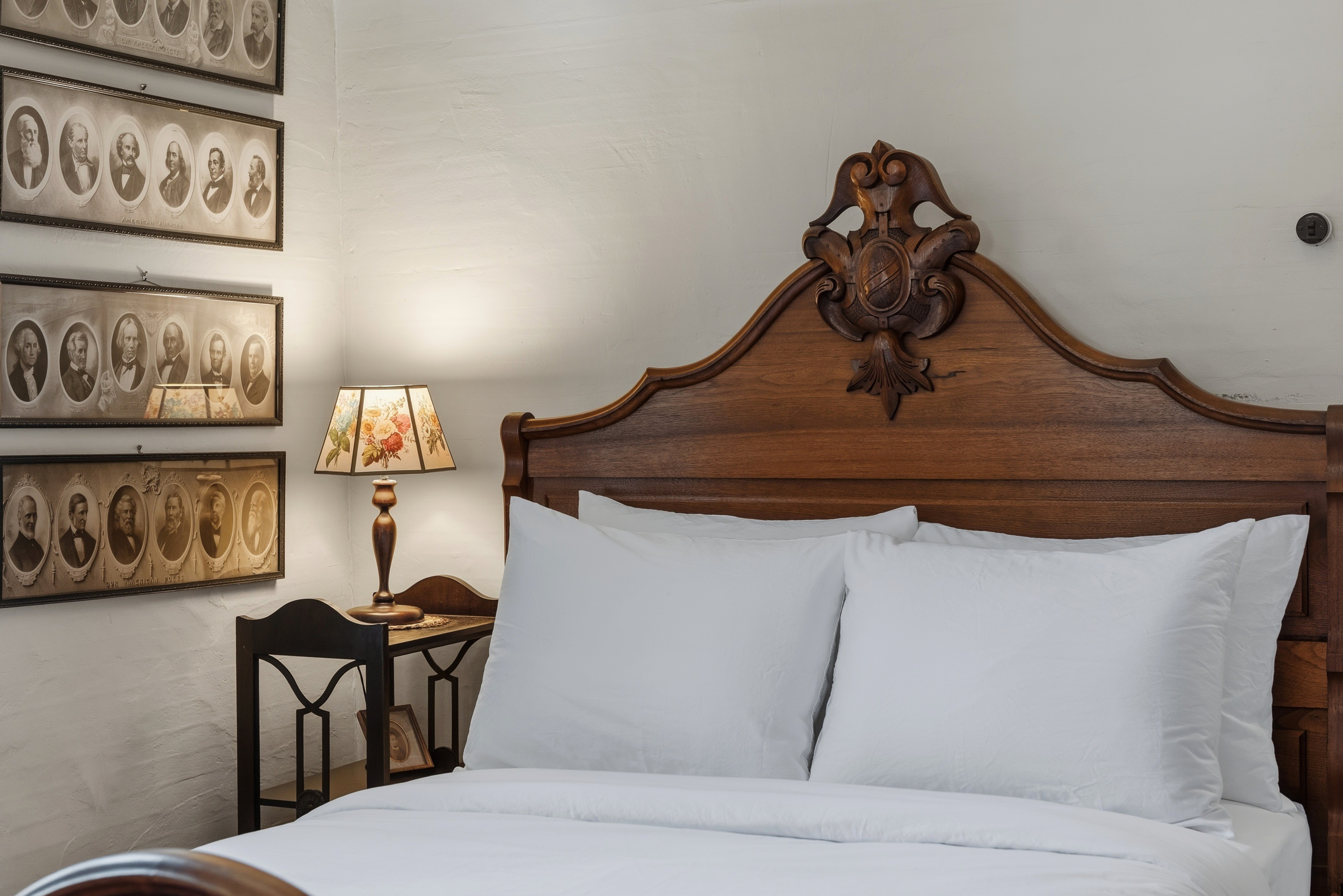Queen bedroom on main floor w/ classic wood bed frame