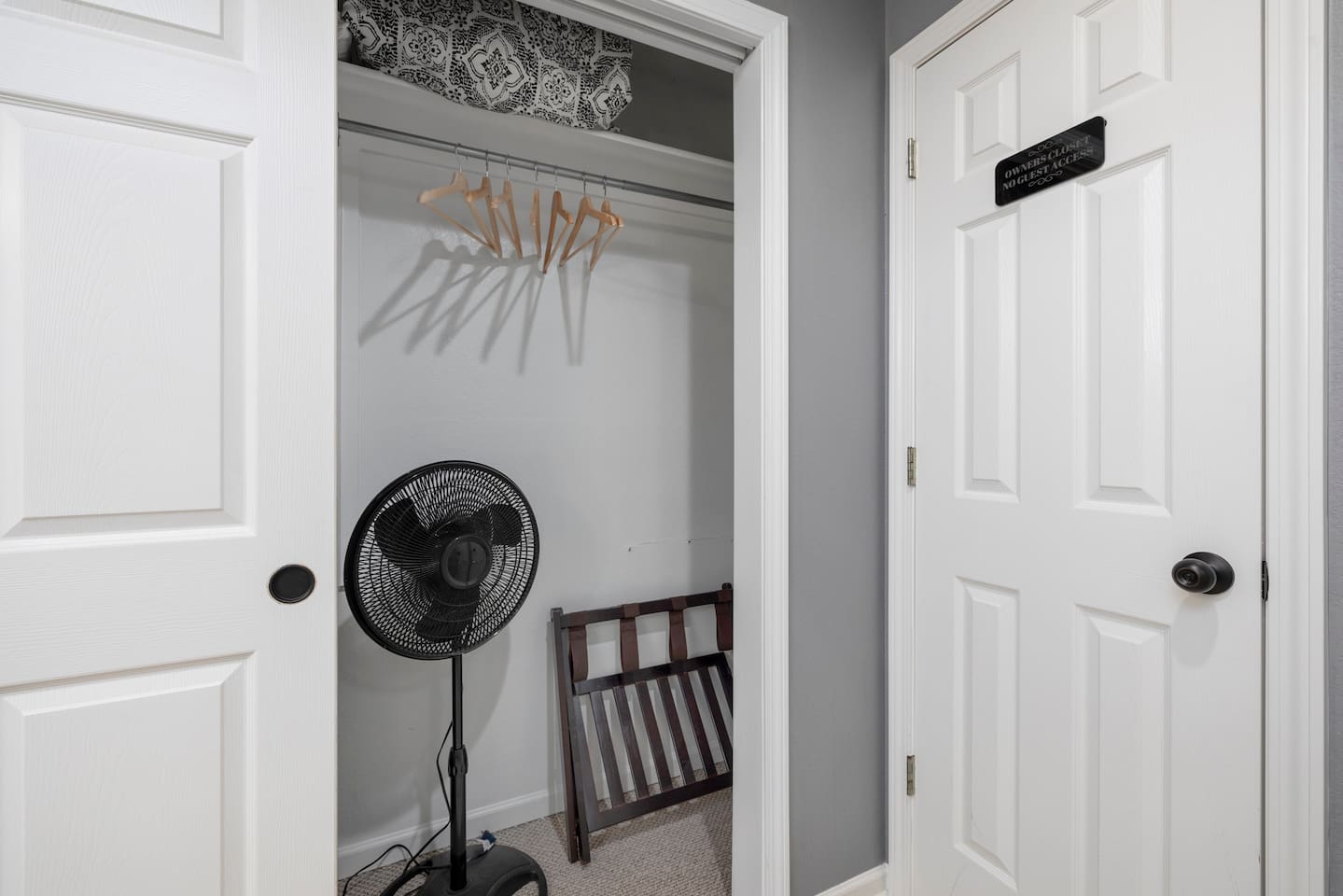 Storage Space: Convenient closet with a fan and extra hangers for all your vacation essentials!