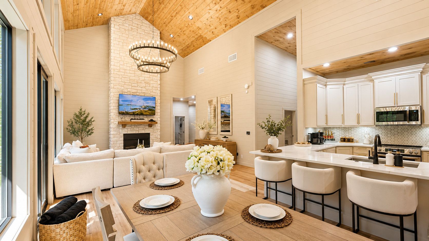 Living Room: Enjoy gatherings under the soaring ceiling and chandelier, with a stunning view!