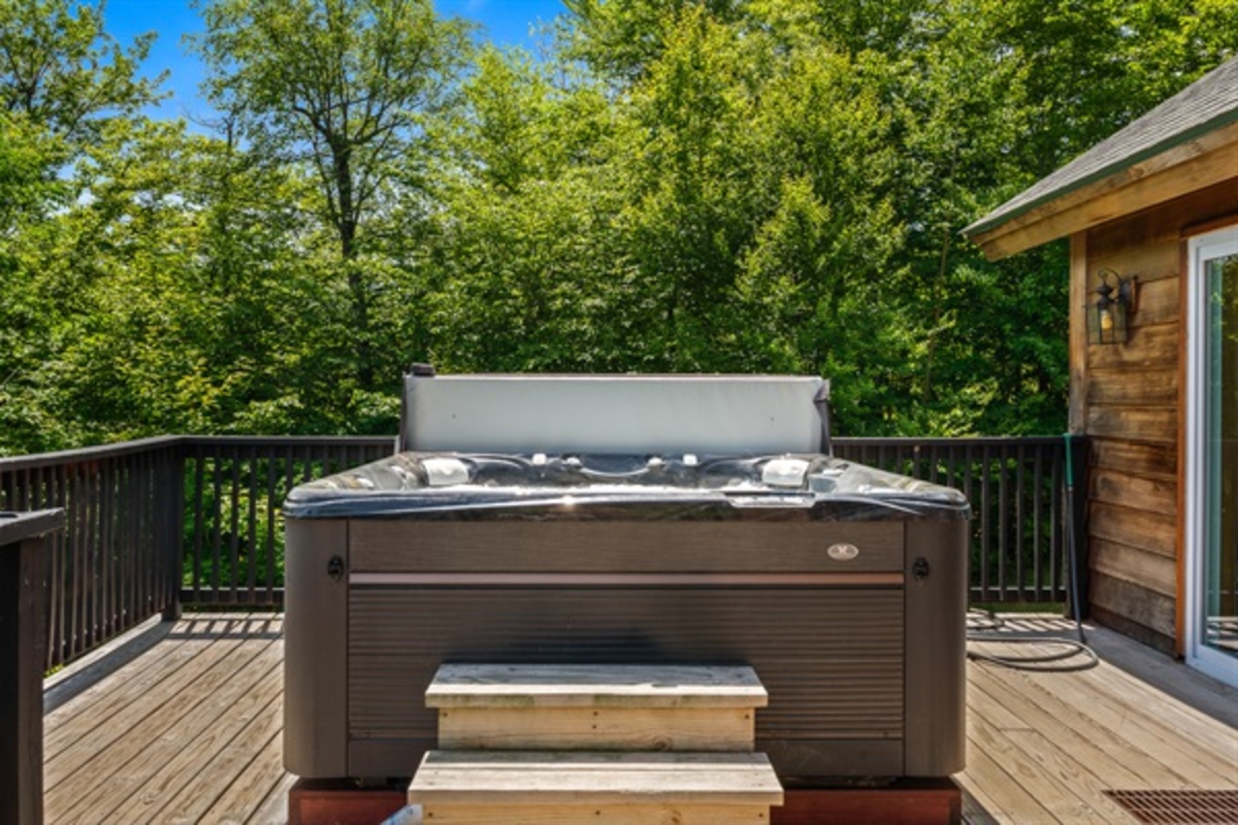 Slip into the private hot tub on the deck and let mountain air and quiet surroundings melt the day away.